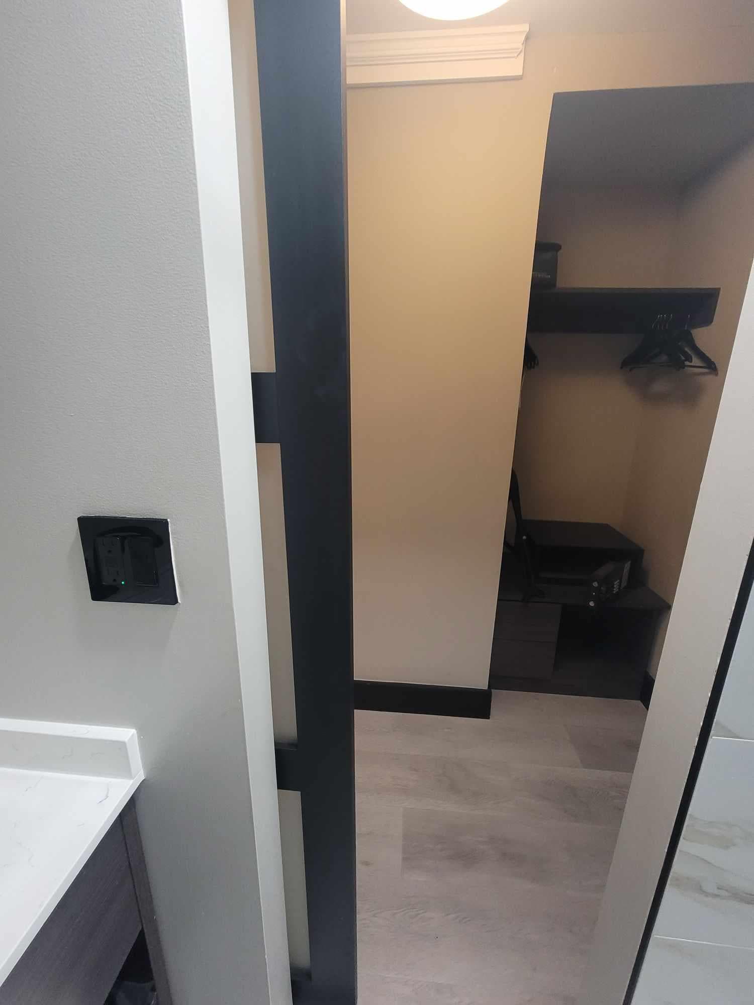 Bathroom sliding door was not wide enough to walk through and got stuck. Very difficult.