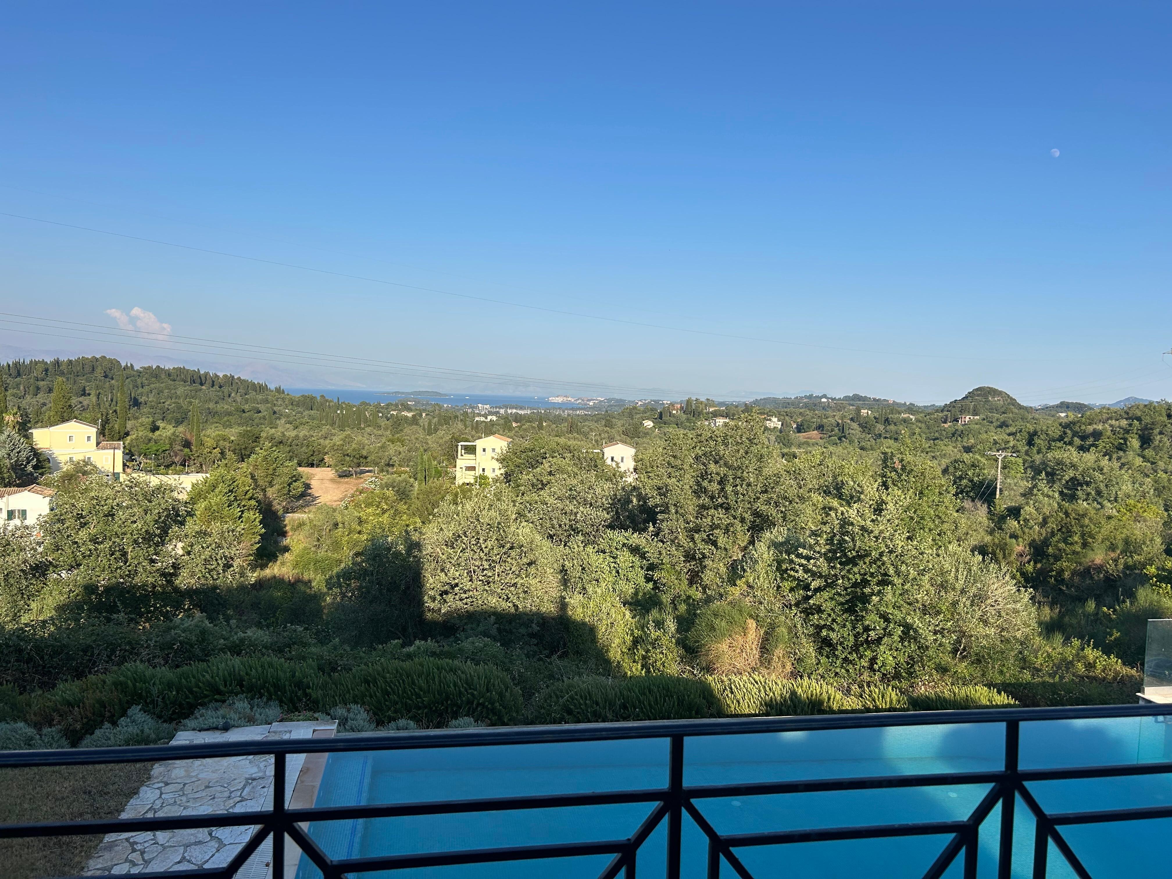 The edge of the veranda with the beautifully maintained pool below.