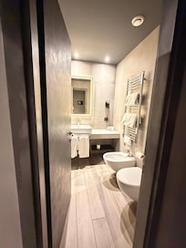 Shower behind the door.