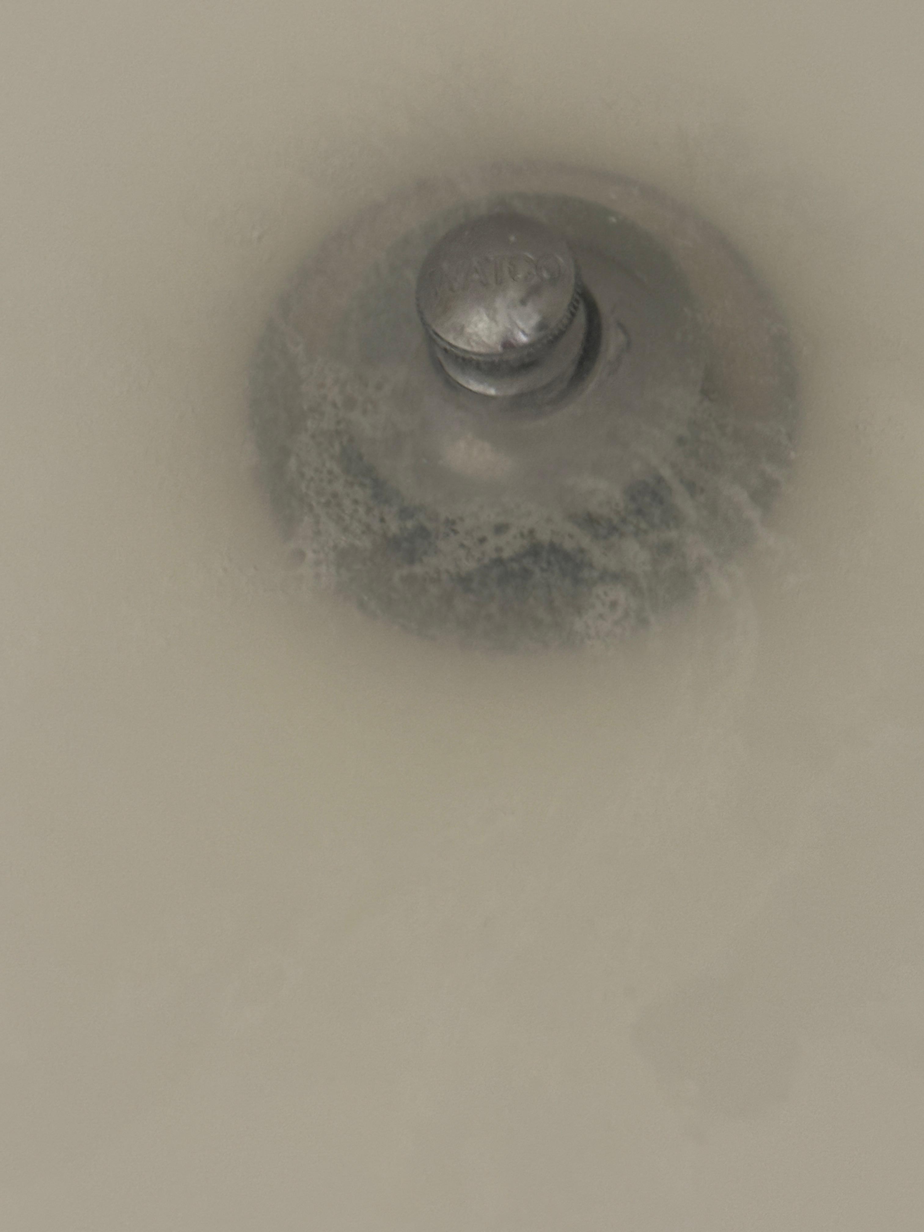 WATER STANDING IN TUB WHEN ARRIVED