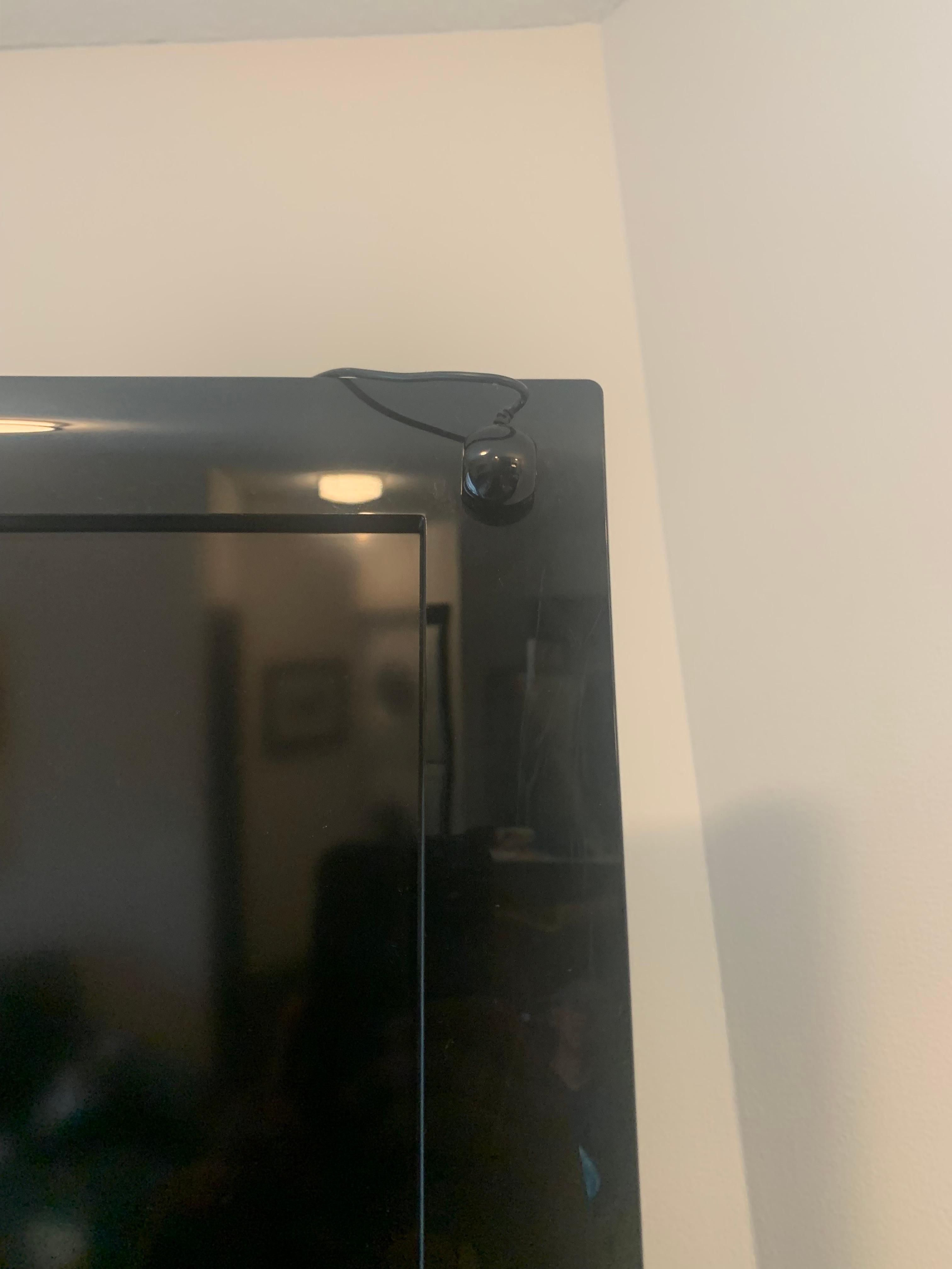 Looks sketchy seems like small camera or something
Which I covered it