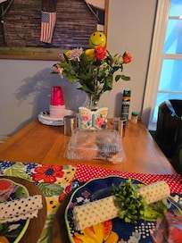 Nice personal touch of fresh flowers and donuts