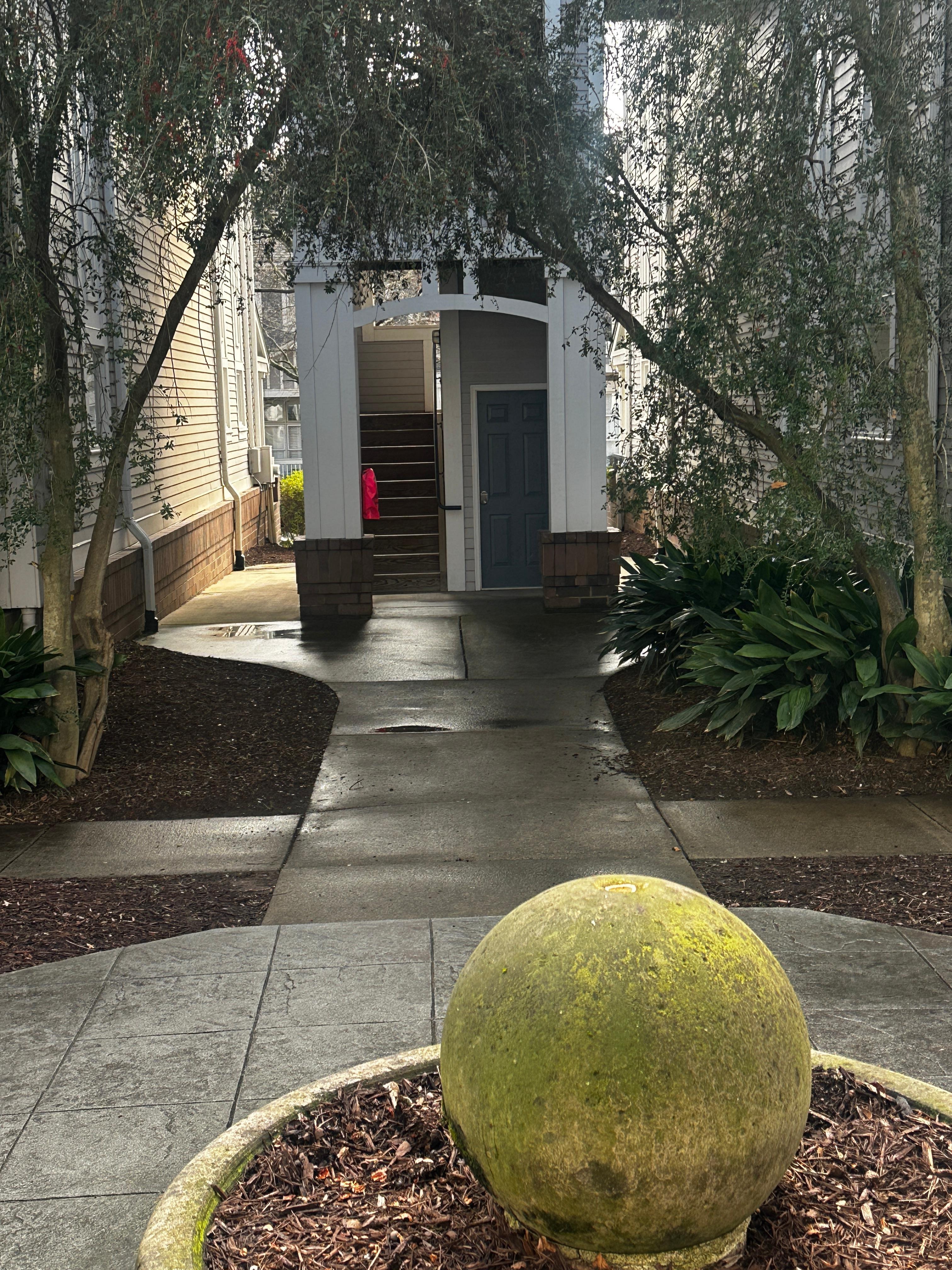 From the parking lot go through the courtyard to the stairwell closest to the street (Alexander St.) 