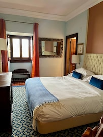 The bedroom. Lovely but it's a bit tight between the bed and the dresser.