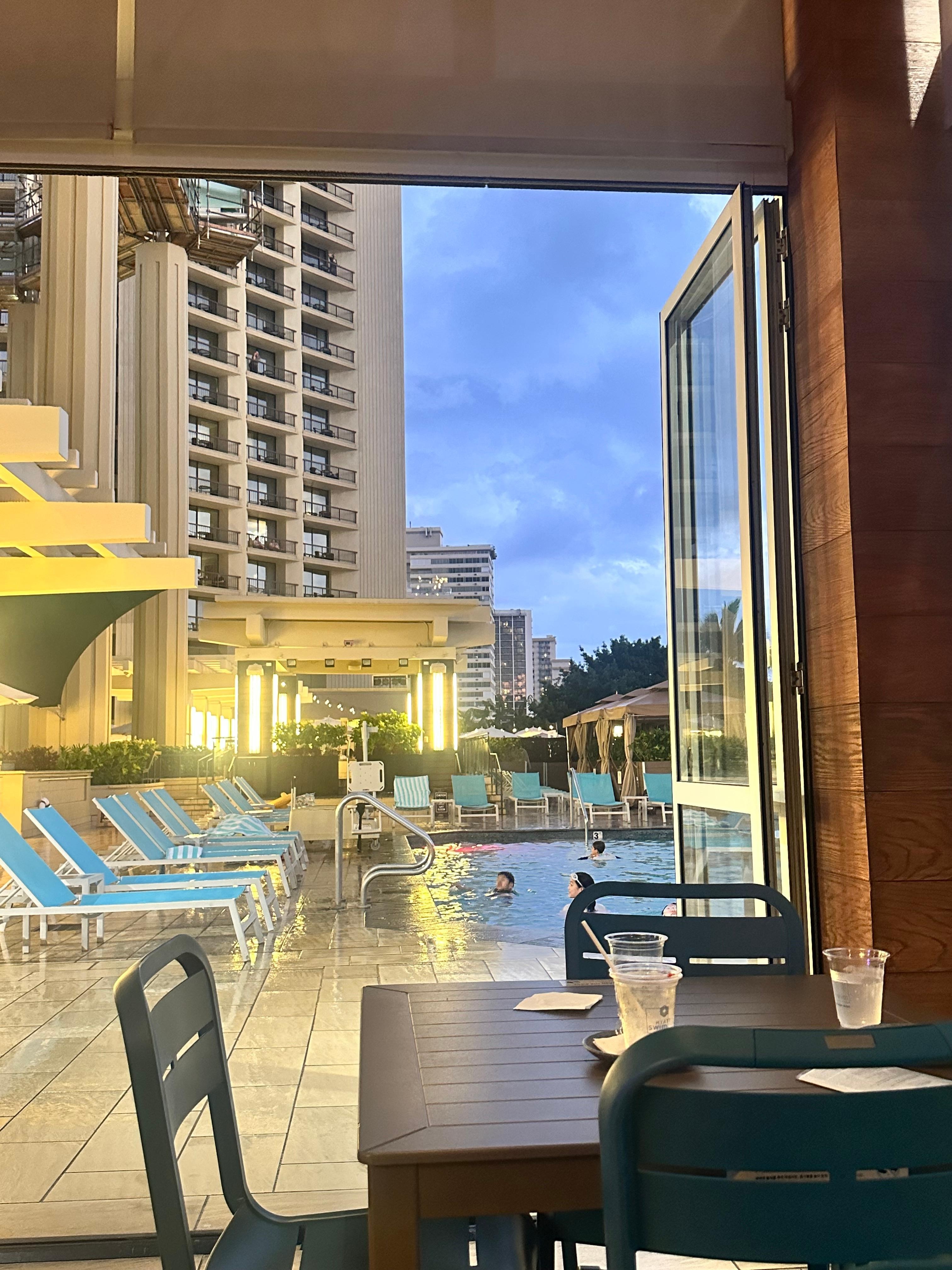 Enjoyed cocktails and appetizers at the pool bar, along with live music and friendly staff. 