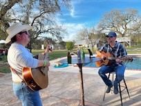 Playing guitars on the back deck