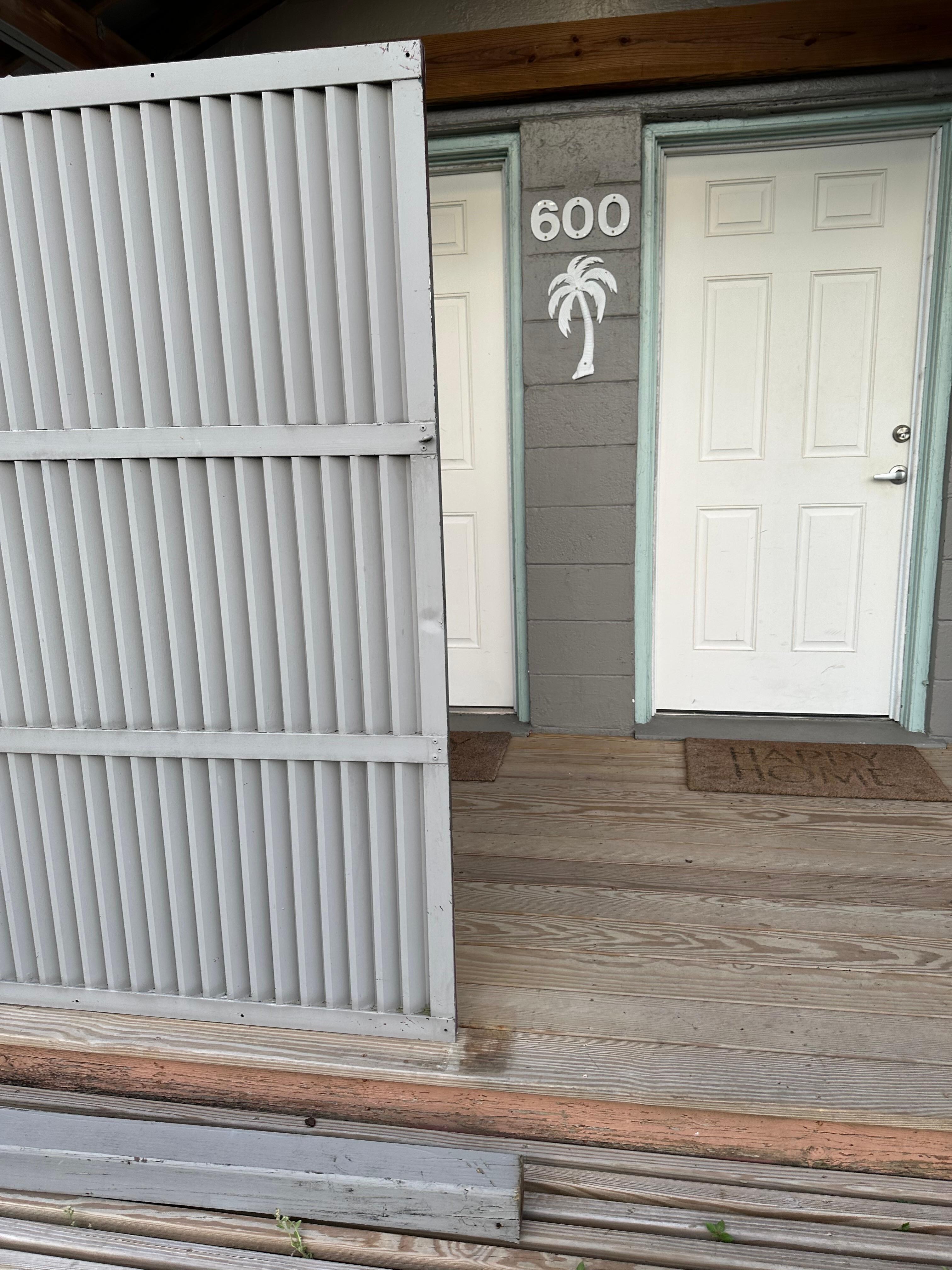 The privacy screen on the front porch after the 3x3 post fell 