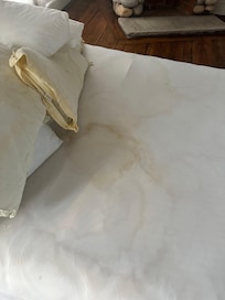 Stained bed and pillowcases