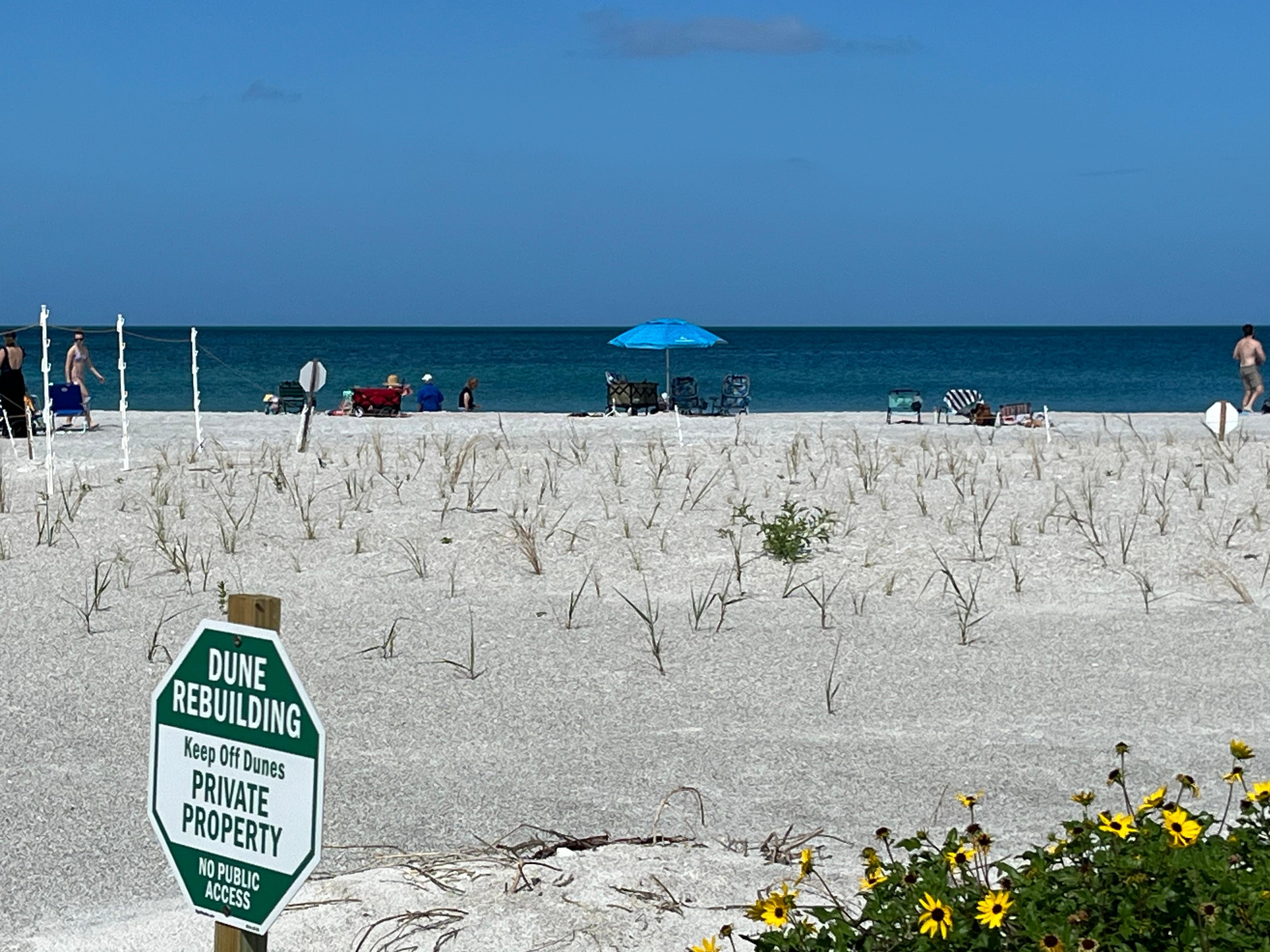 Our pool deck table view that comes with umbrella 