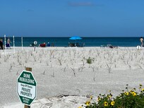 Our pool deck table view that comes with umbrella