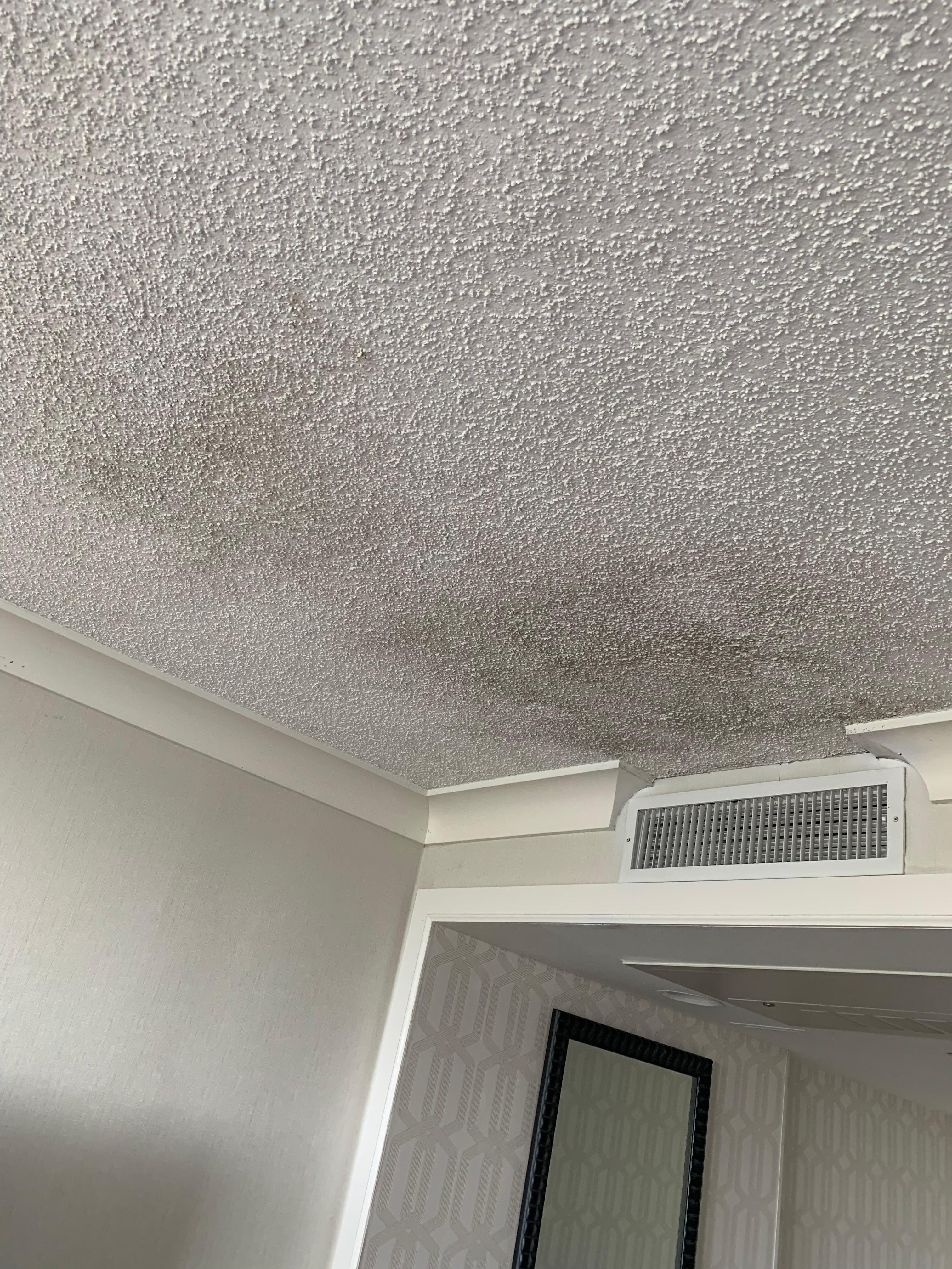 Concerning black stain on ceiling by the vent