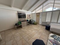 Vaulted ceiling - because of the glass at the top, it doesn’t get completely dark in the dark. We didn’t mind at all. Loved the natural light!