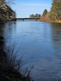 In front of the porch looking down river.