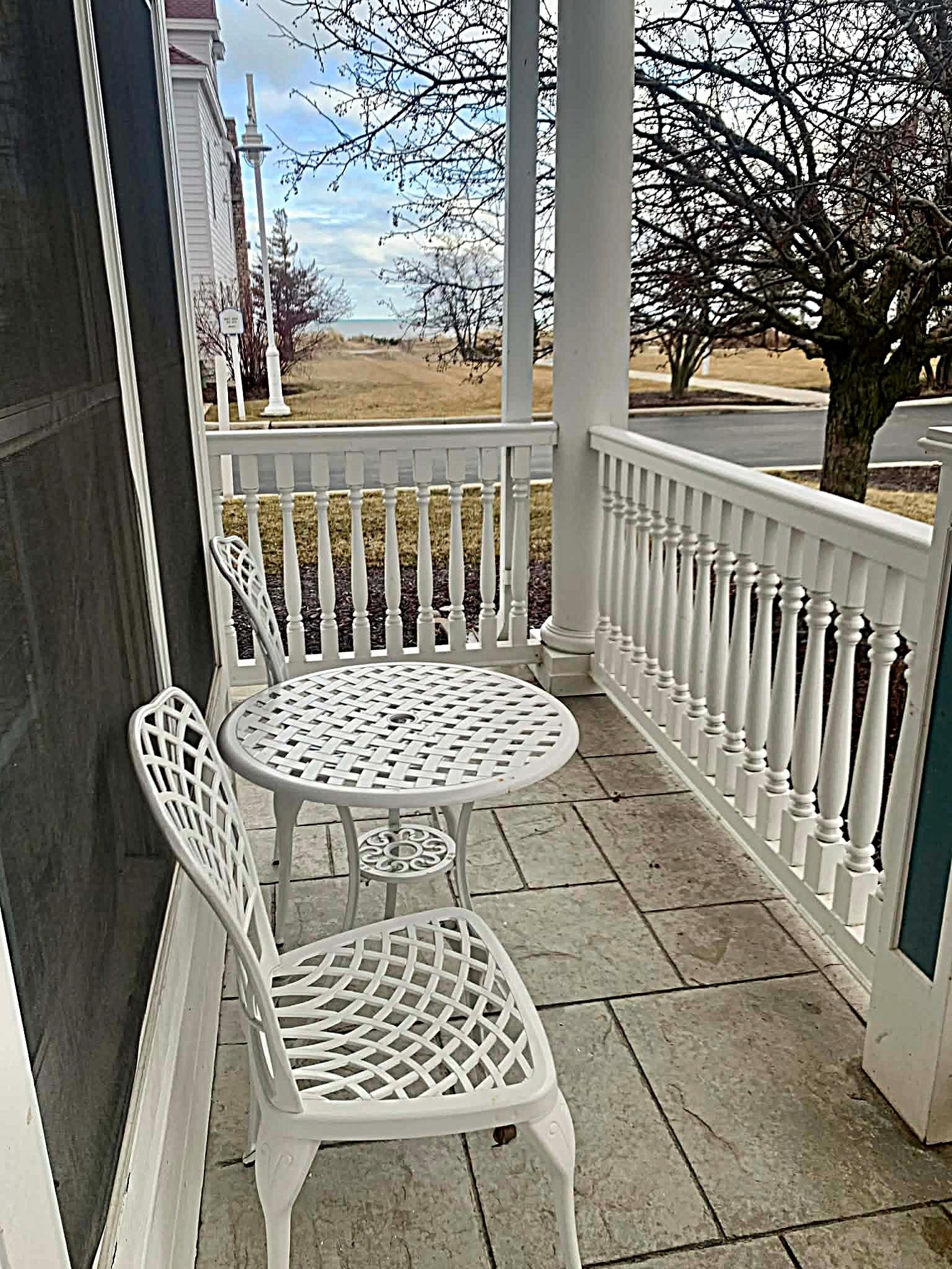 Porch with Lake Michigan steps away.
