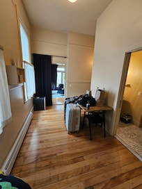 Dining area, kitchenette, door to bathroom