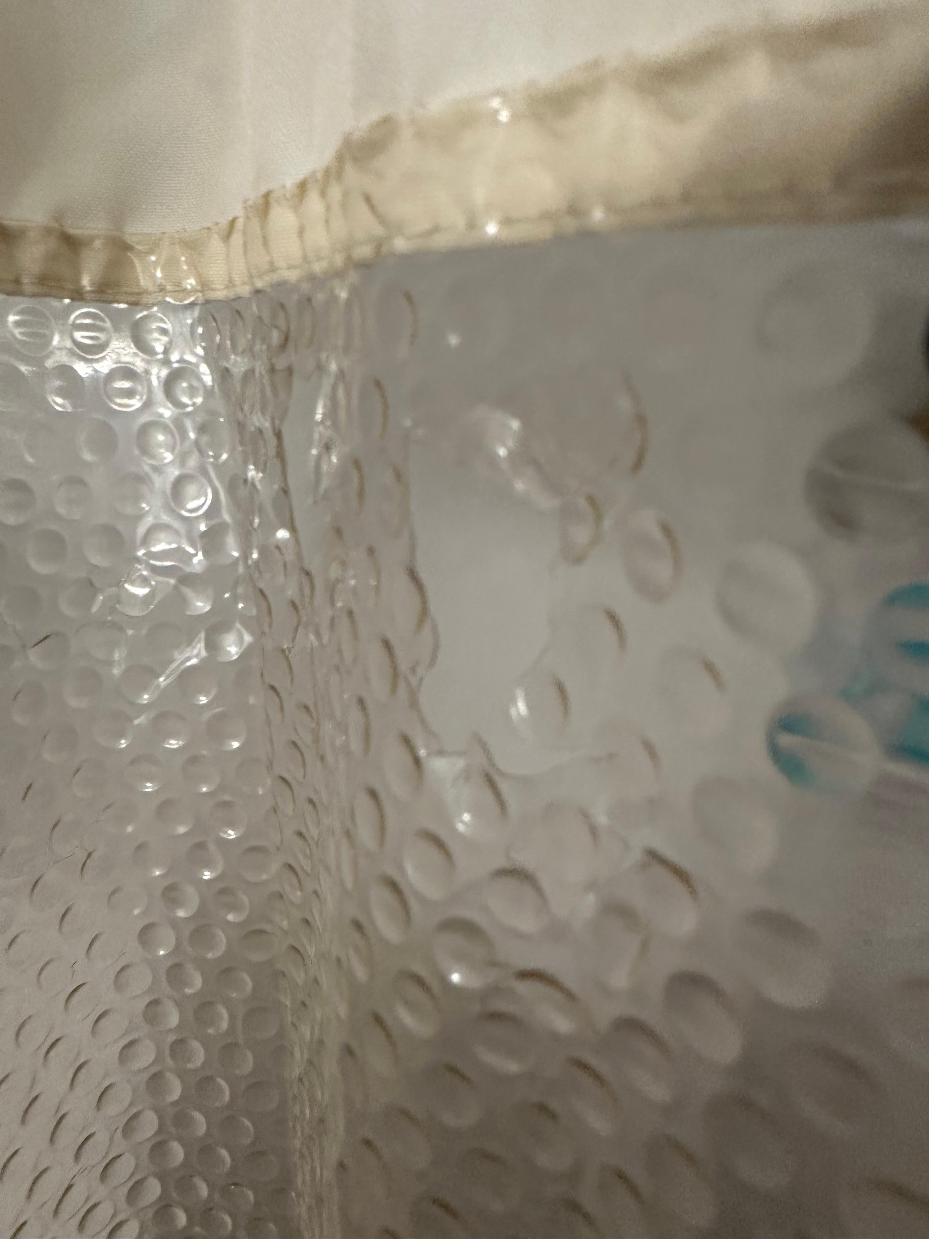 Holes in the shower curtain