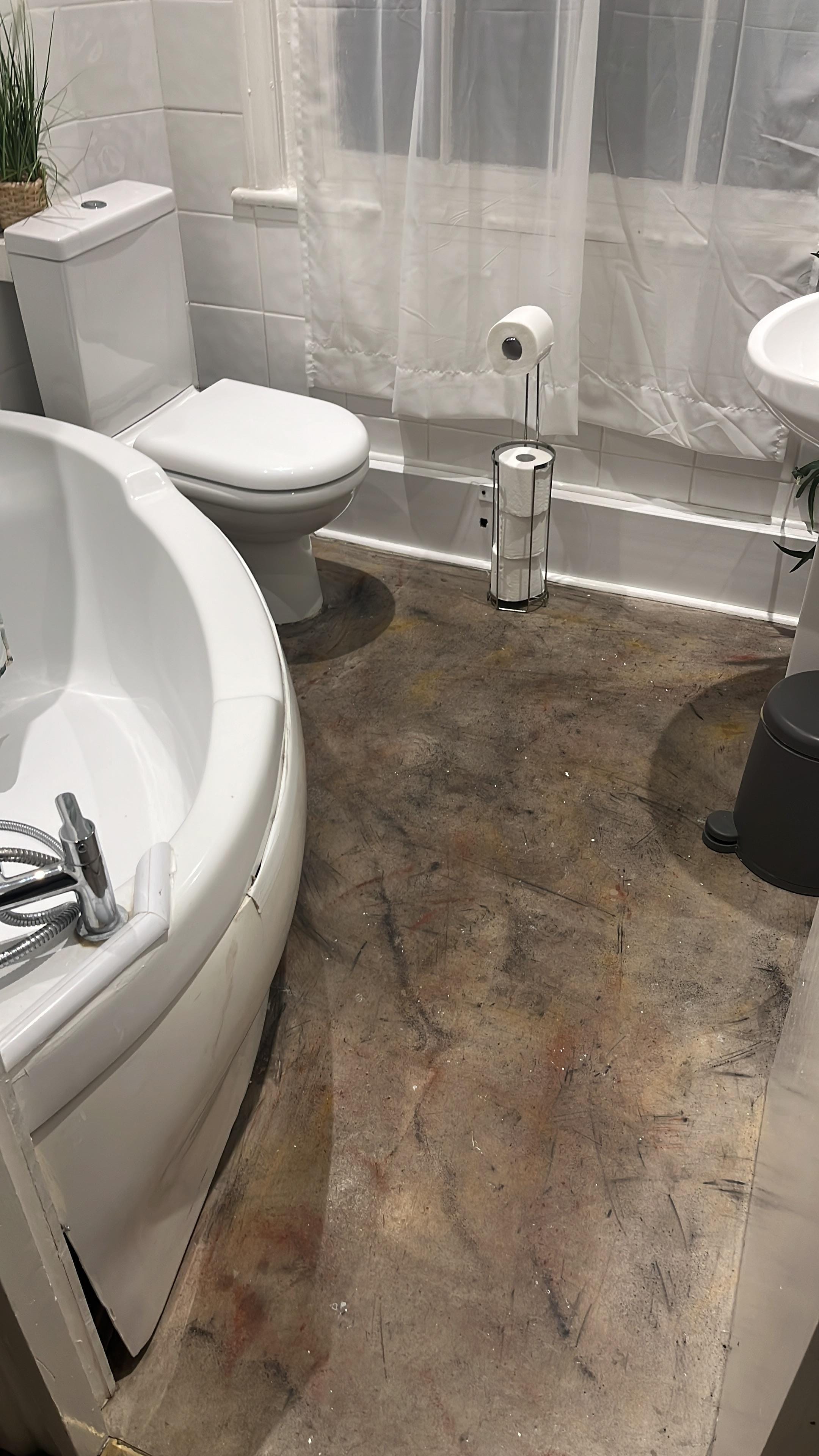 No adequate flooring, broken bath. 