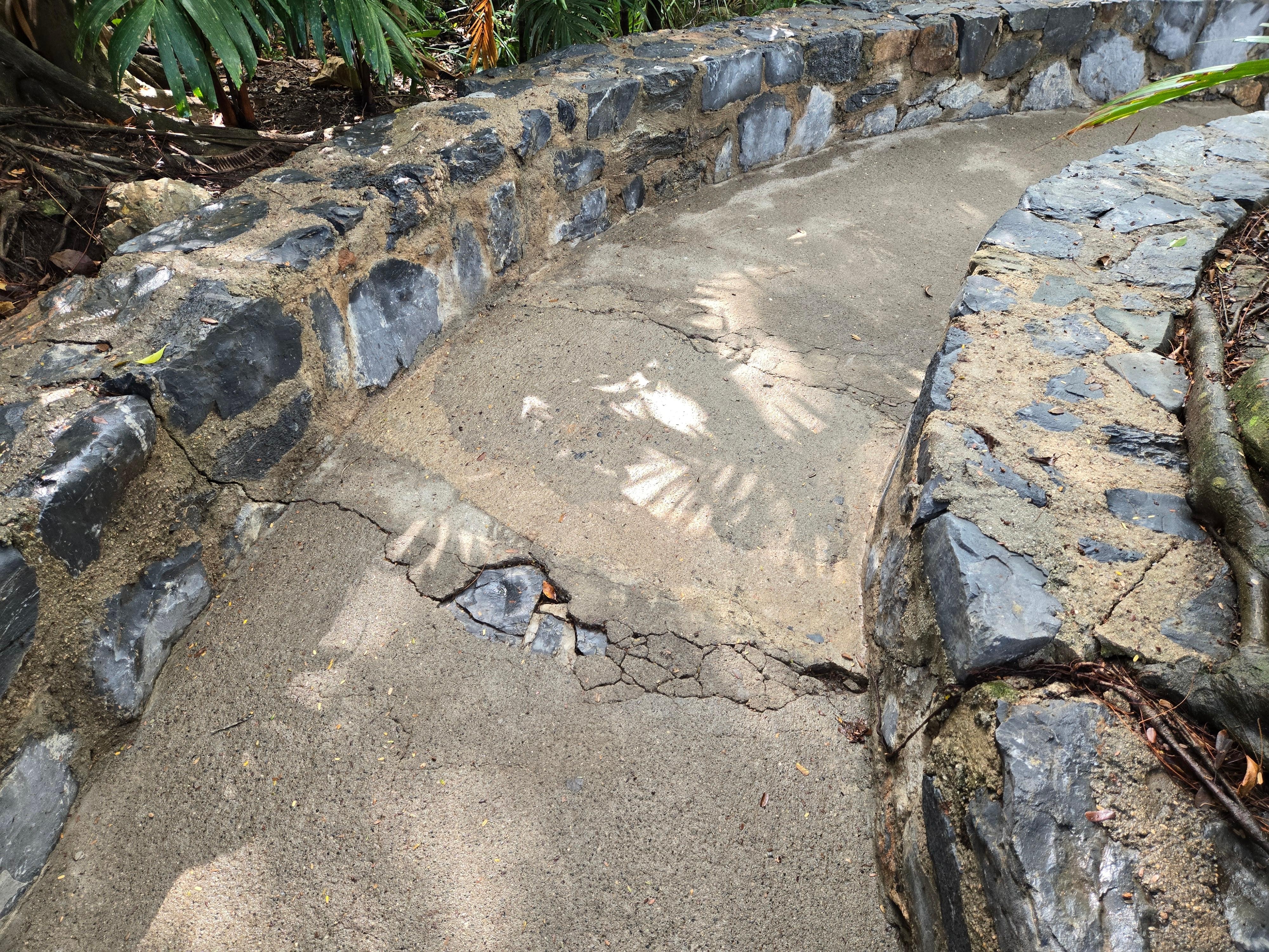 Dangerous cracks and steps steps everywhere.