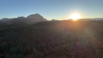 Sunrise from a hot air balloon.