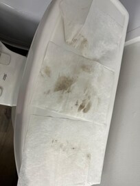 Wet wipes I used to clean bathroom door and light switch