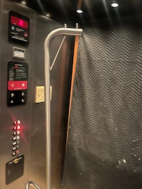 Elevator being protected by moving blankets