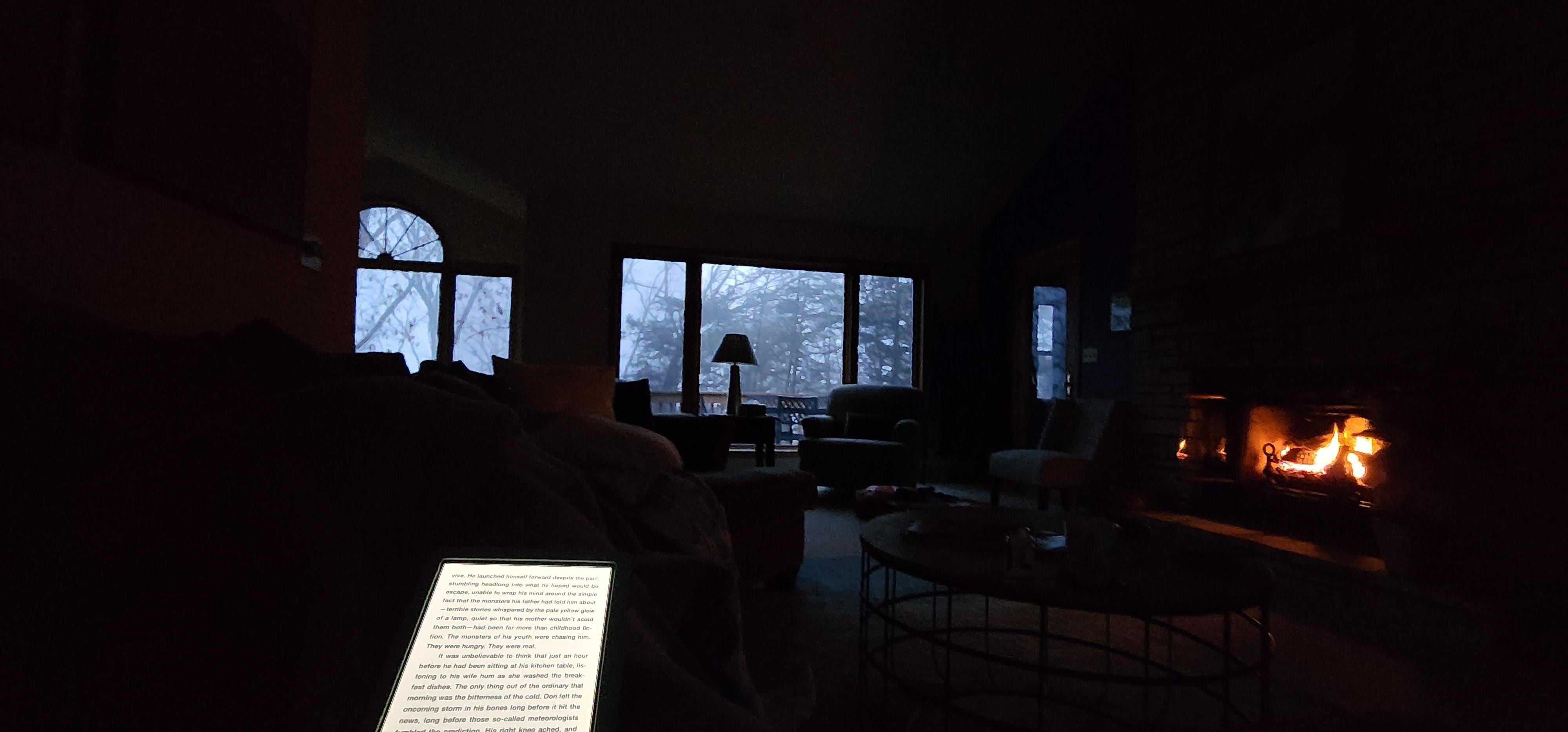 Starting the day with a book by the fire