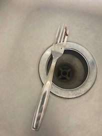 Dirty fork found in clean utensil drawer