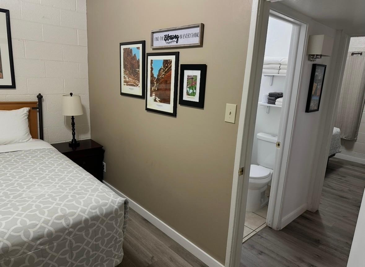 Bedroom 1, looking through to bathroom & Bedroom 2