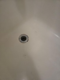Mold around drain, cleaned up well with bleach though.
