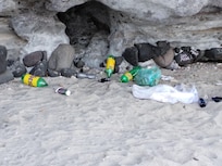 Same like previous photo, trash on the beach.