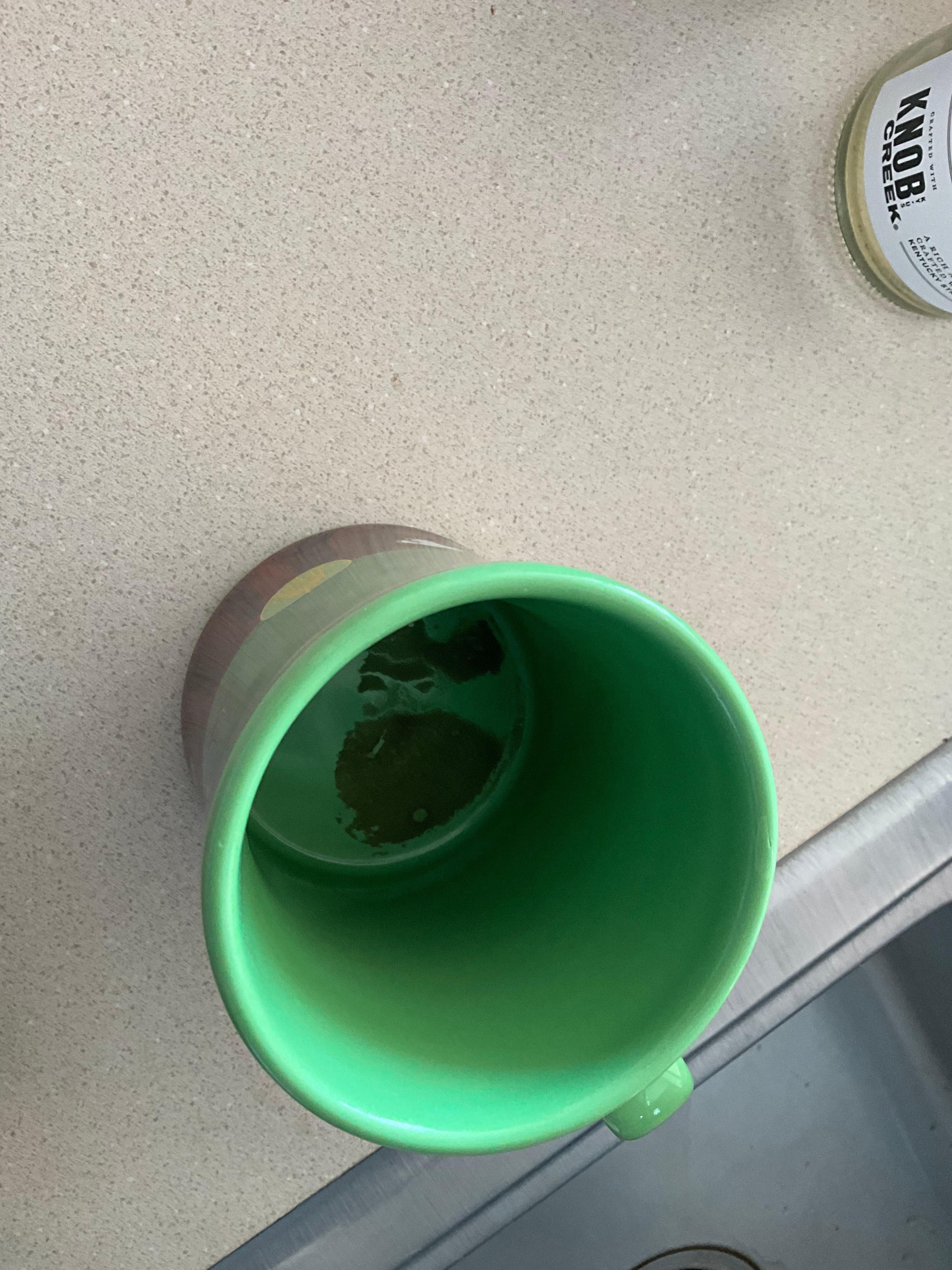 dried up drink in cup from cabinet.