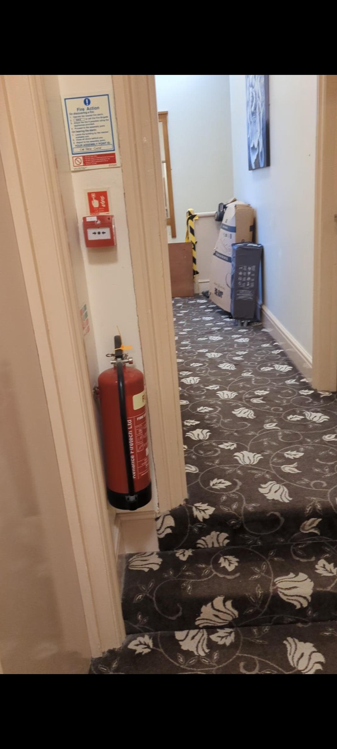 End of corridor by room