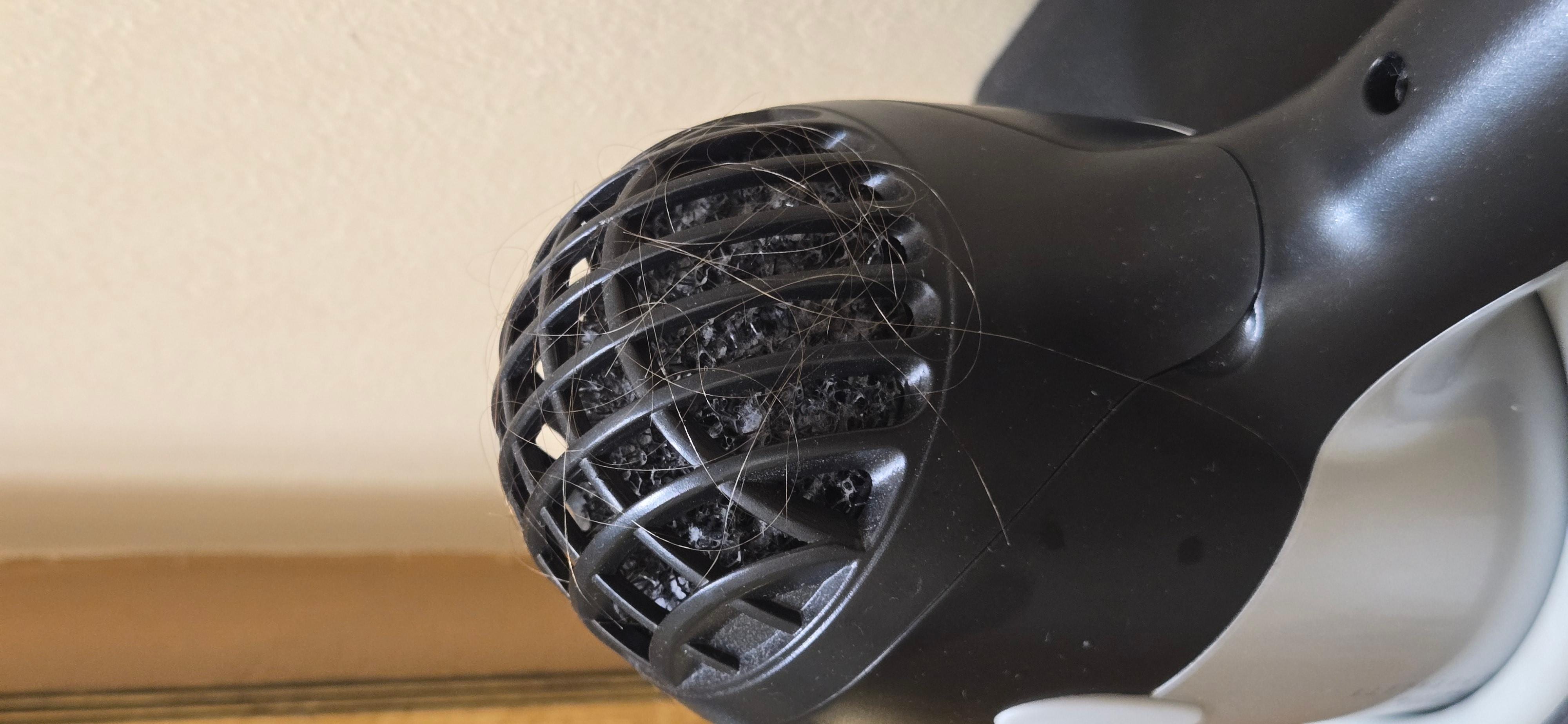 Hair covered on the blow dryer