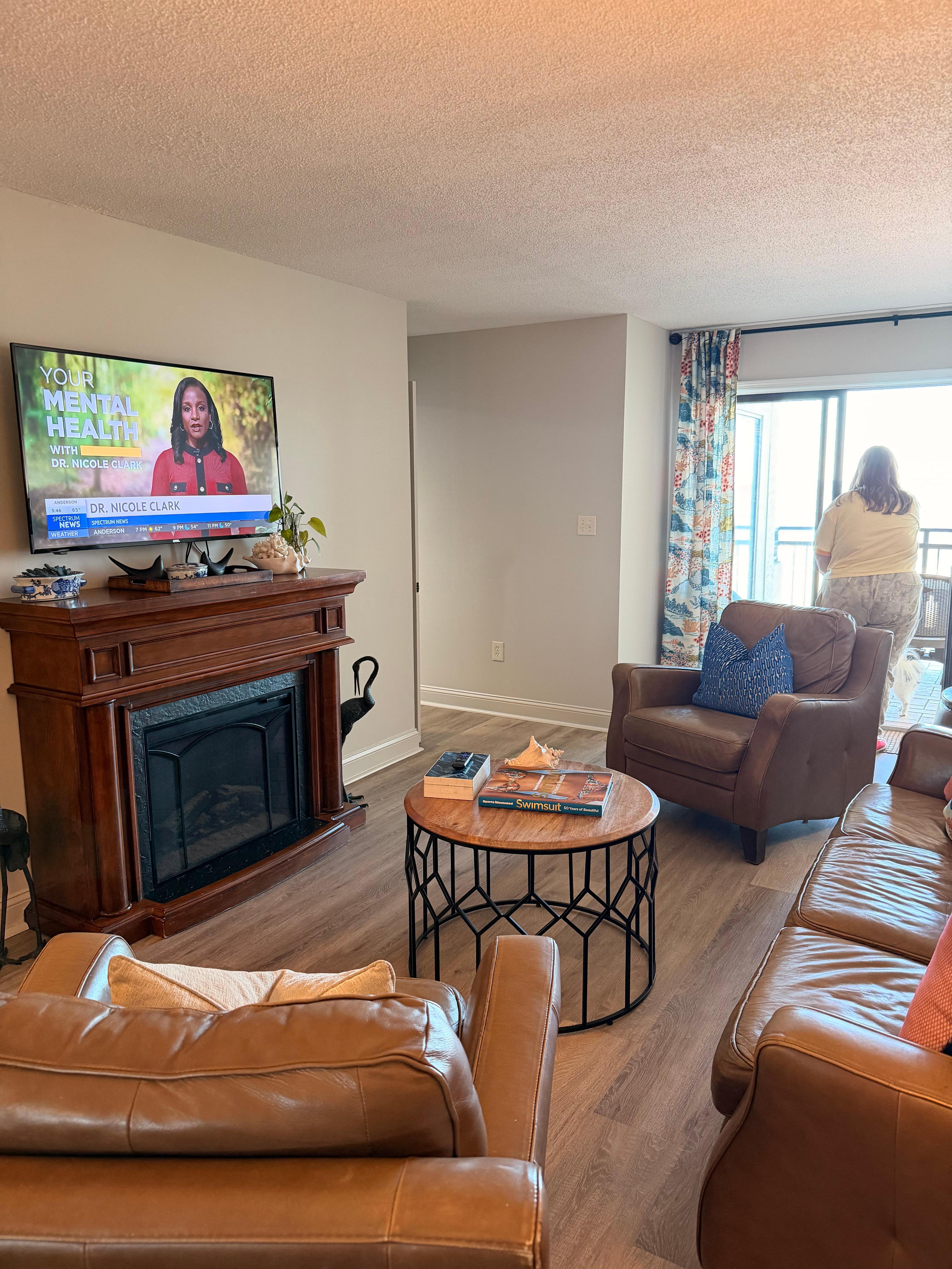 Living room, the chairs and couch are a bit of a struggle to get out of for older people.  