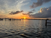 Sunrise on the bay side in back of the property.