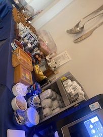 Buffet breakfast, more than just bread and jam. Eggs, cheese, meat, cakes, yogurt, cereal, fruit, all included