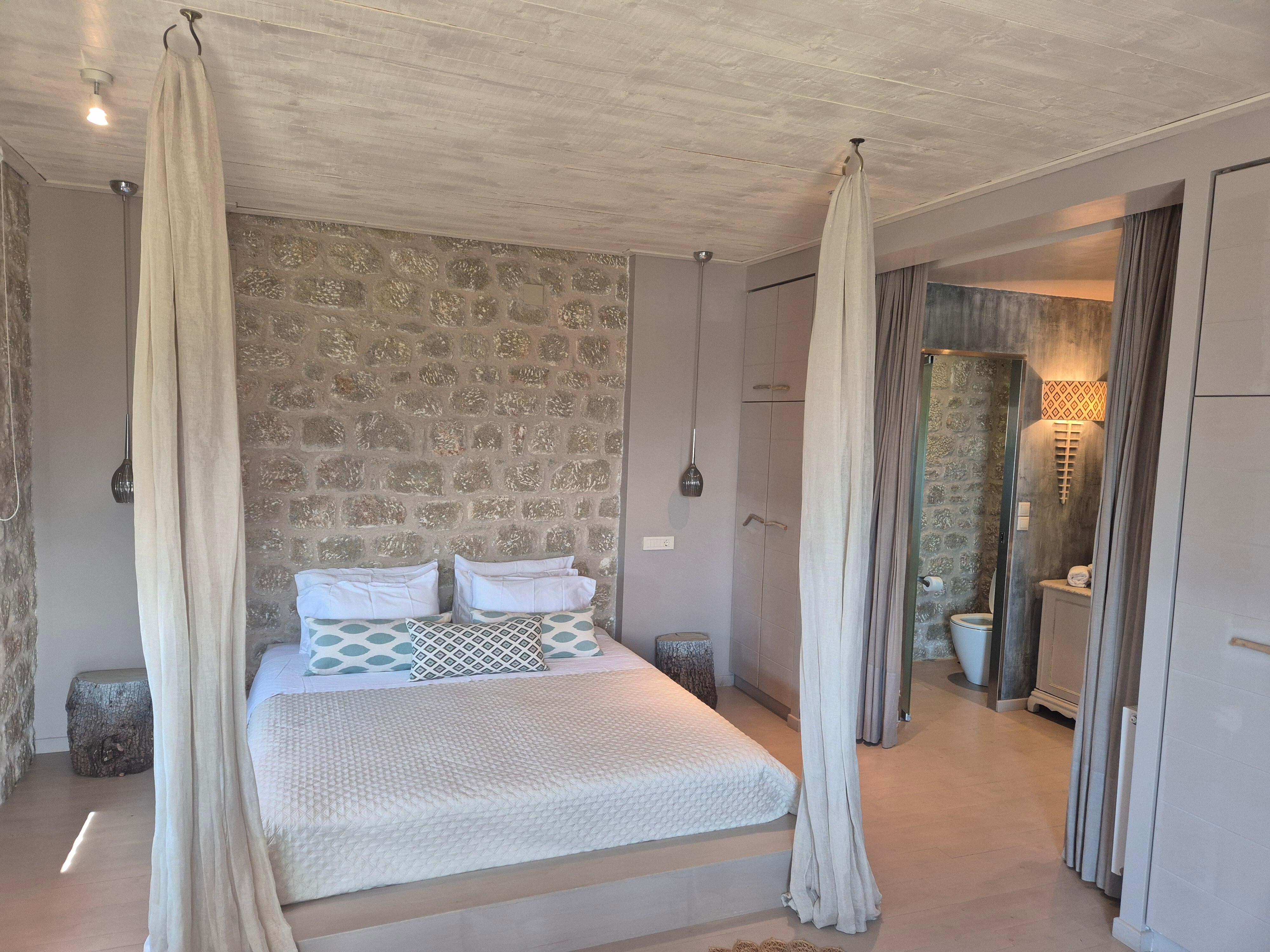 Bedroom looking through to en-suite bathroom.