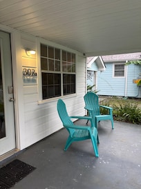 Covered porch, stays shady all day, great for reading, or morning coffee!