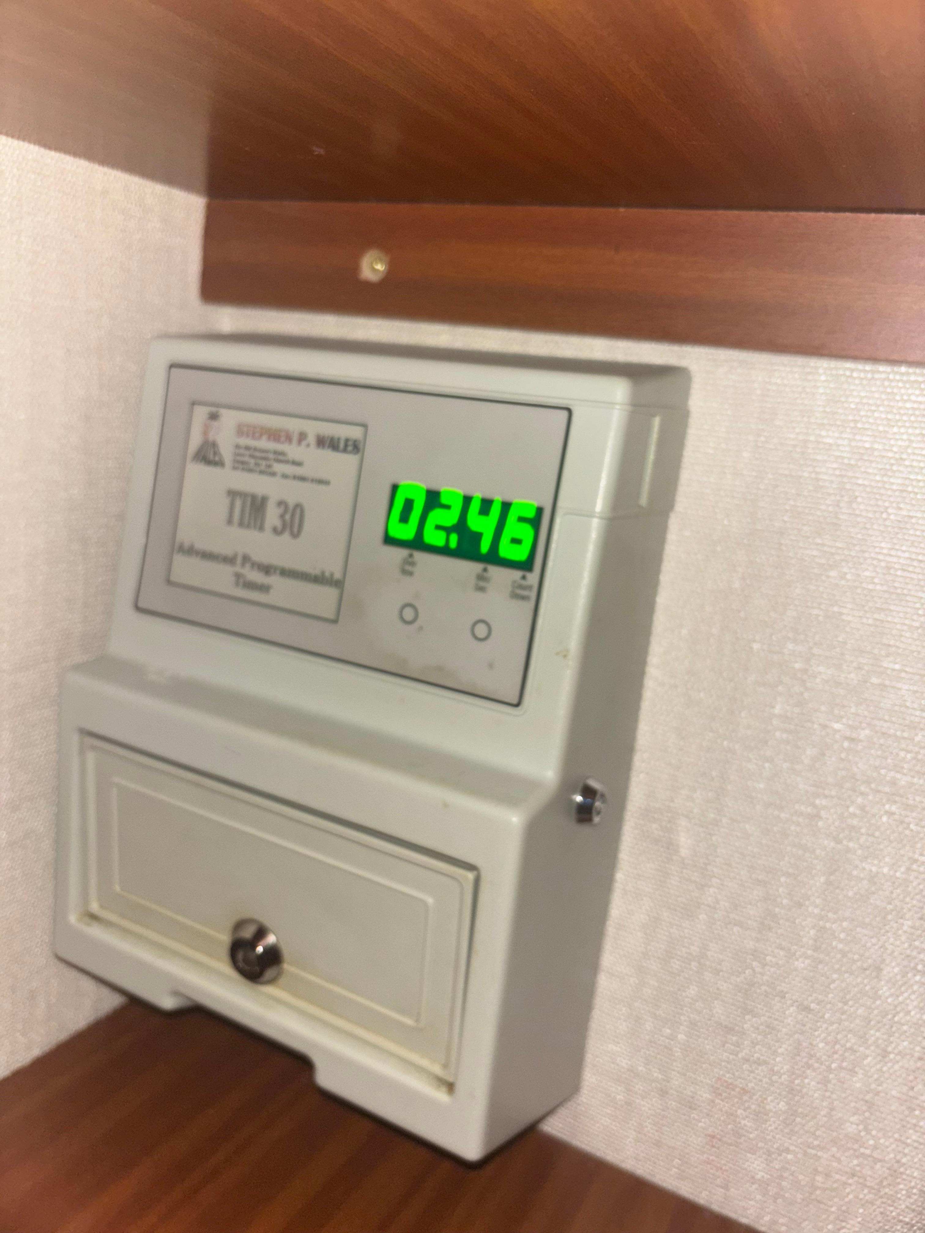 Air conditioner - coin  machine. The coin slot is on the side and the screen shows the time left. 