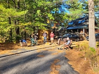 Enjoying cornhole and sunshine at 6 Bow Lane