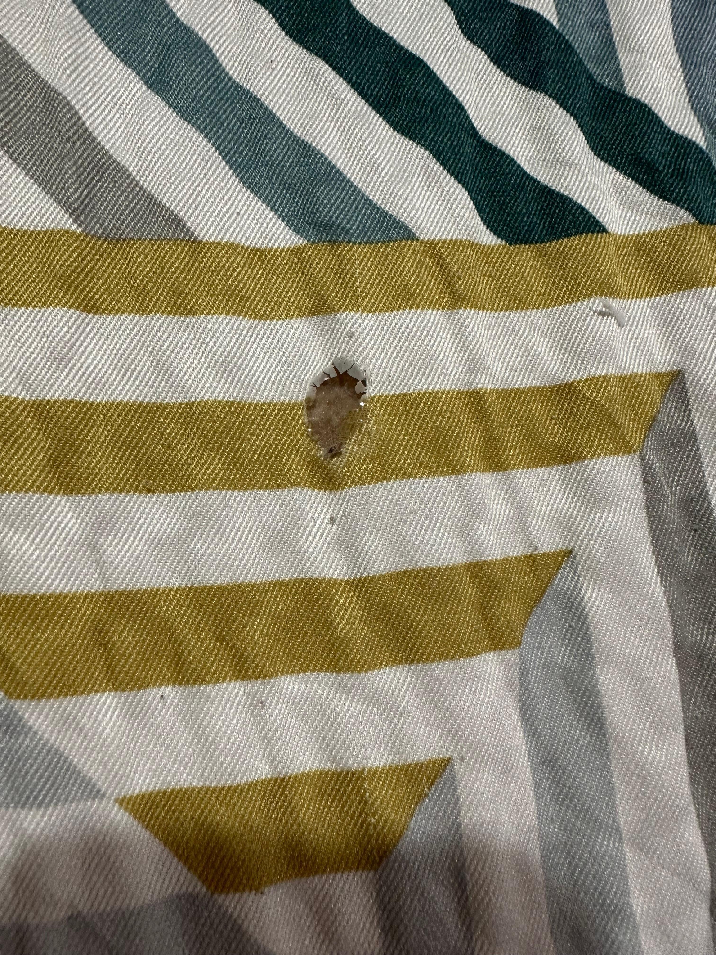 1 of the Holes in blanket in the second room