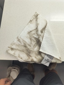 This is what a towel looked like after my son wiped up the water he spilled near the mini-fridge.