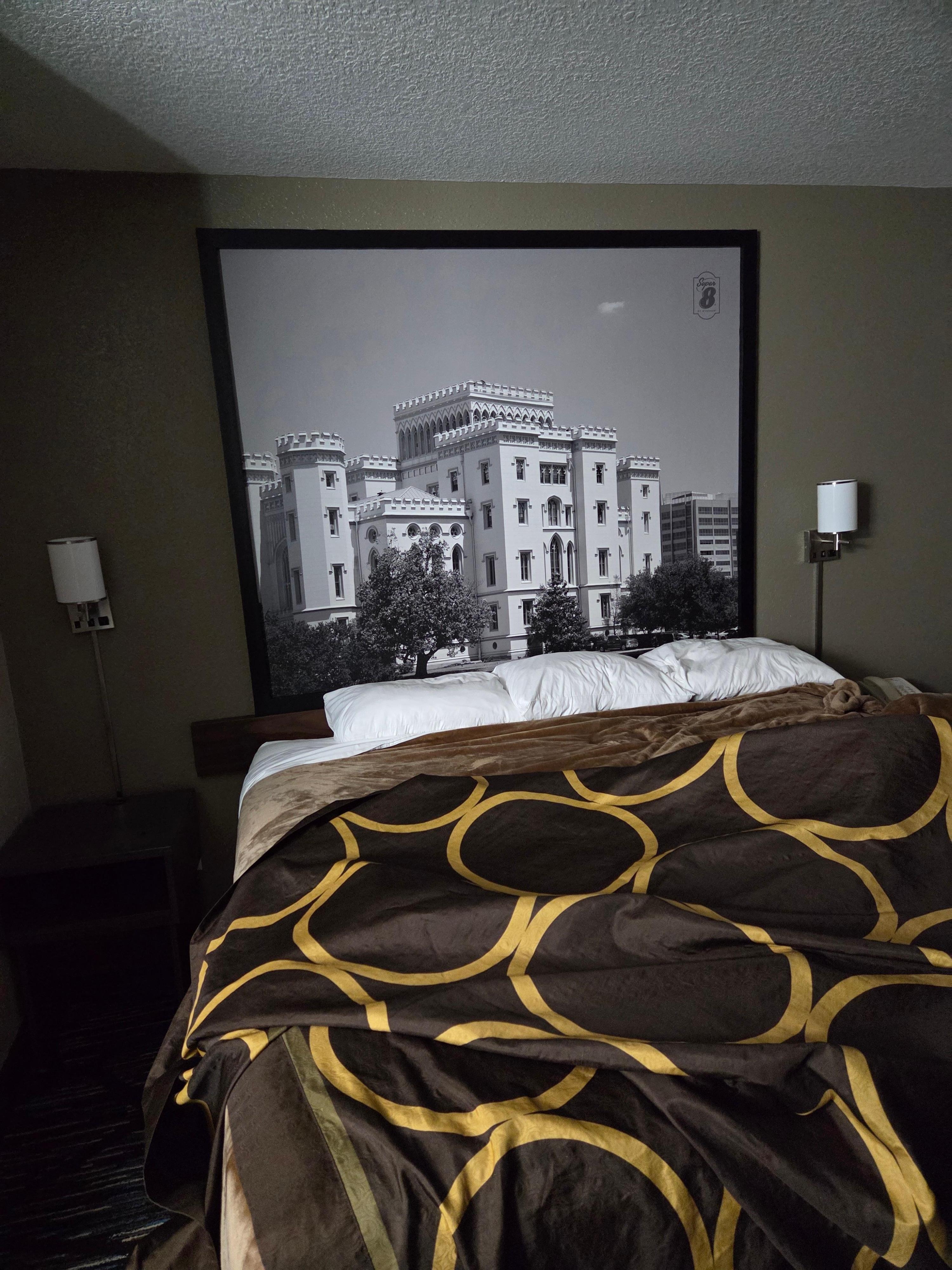 I remade the bed the best I could before photo. Lol