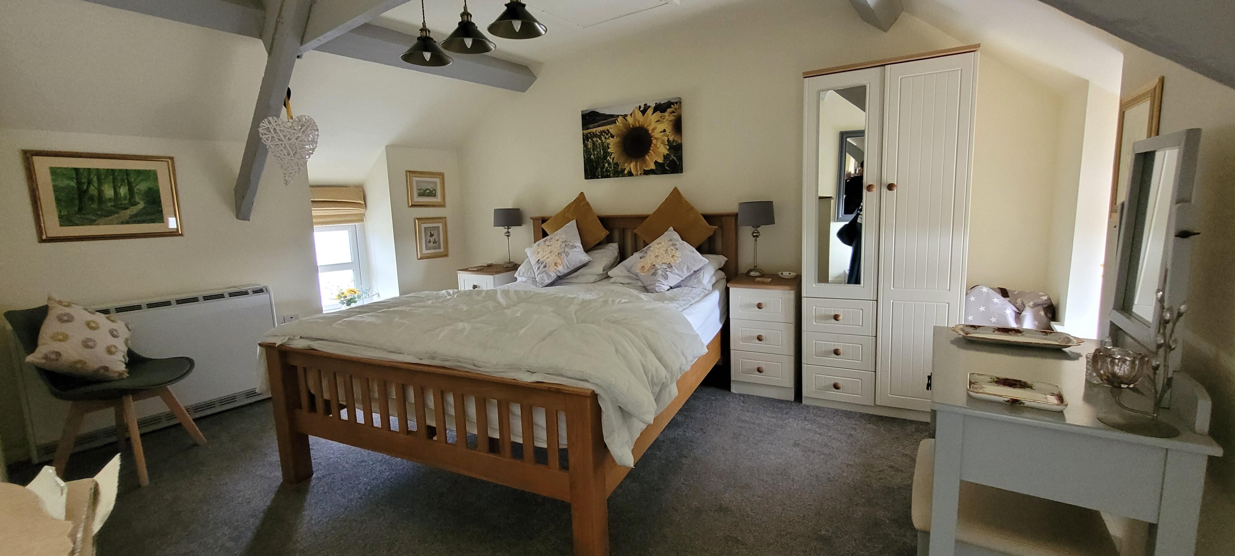 Gorgeous bedroom with a  huge comfortable bed.