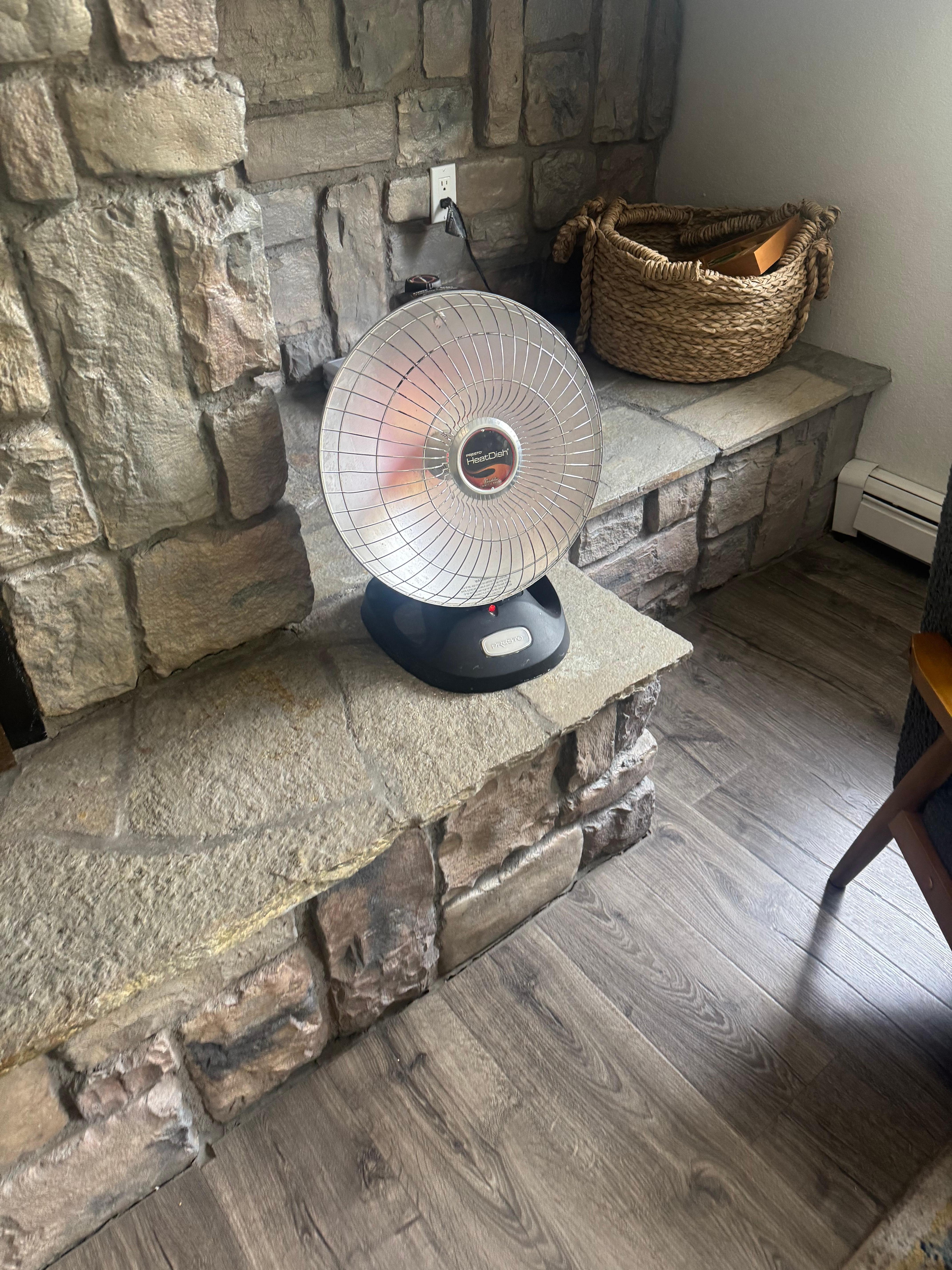 Personal heater in living room as substitute for main heater, which did not work on the main floor. 