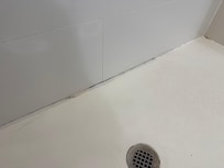 Discolored & peeling caulk in shower