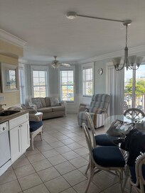 Kitchen, living area, balcony to the right