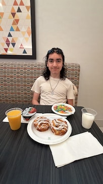 My kiddo happy with the breakfast