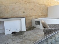 The yard. Dusty and it looked unfinished. Did not want to use it because it was facing the workmen no privacy whatsoever.