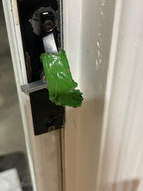 Door handle broken and taped with electrical tape, very sharp.